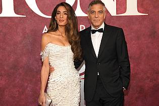 Evan Agostini/Invision/AP/dpa | Gäste von Amal und George Clooney müssen sich von ihren Handys trennen. (Archivbild)