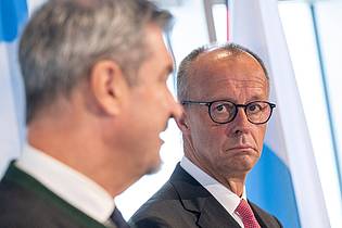 Peter Kneffel/dpa | Zu der Richterwahl äußerte sich der Kanzler bei einem Besuch auf der Zugspitze.