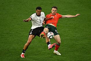 Peter Kneffel/dpa | Im Juni gehörte Diogo Jota (r.) zu Portugals Siegermannschaft in der Nations League. 