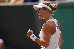 Kirsty Wigglesworth/AP/dpa | Laura Siegemund schreit ihre Freude hinaus.